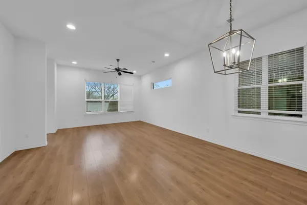 a view of storage and utility room with window