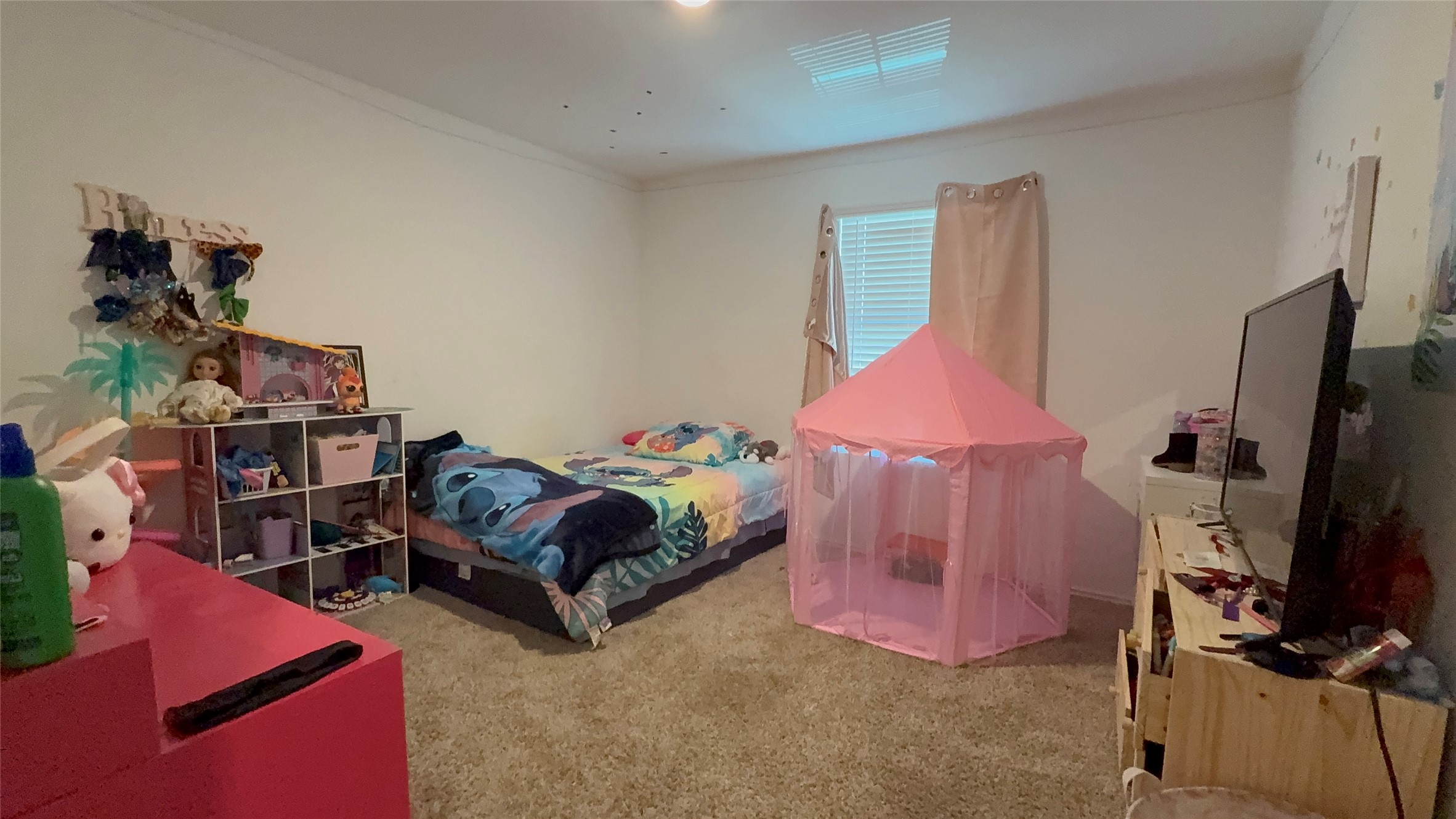 316 Geode Glen Maxwell, TX 78656 - Photo 17 of 24 a bedroom with furniture and a flat screen tv