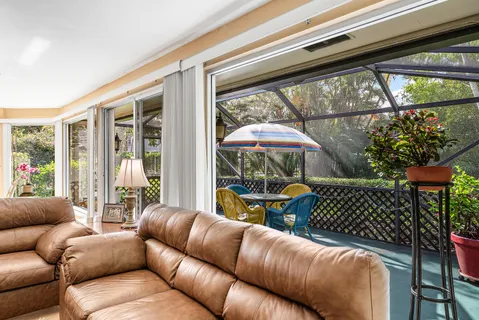 a view of an outdoor sitting area with furniture