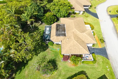 a bird view of building and garden