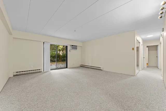 a view of an empty room with window