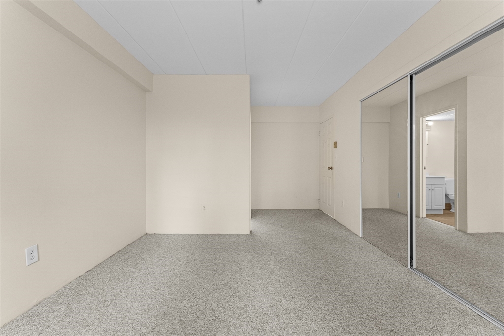 135 Pleasant Street, Unit 106 Brookline, MA 02446 - Photo 26 of 27 a view of an empty room