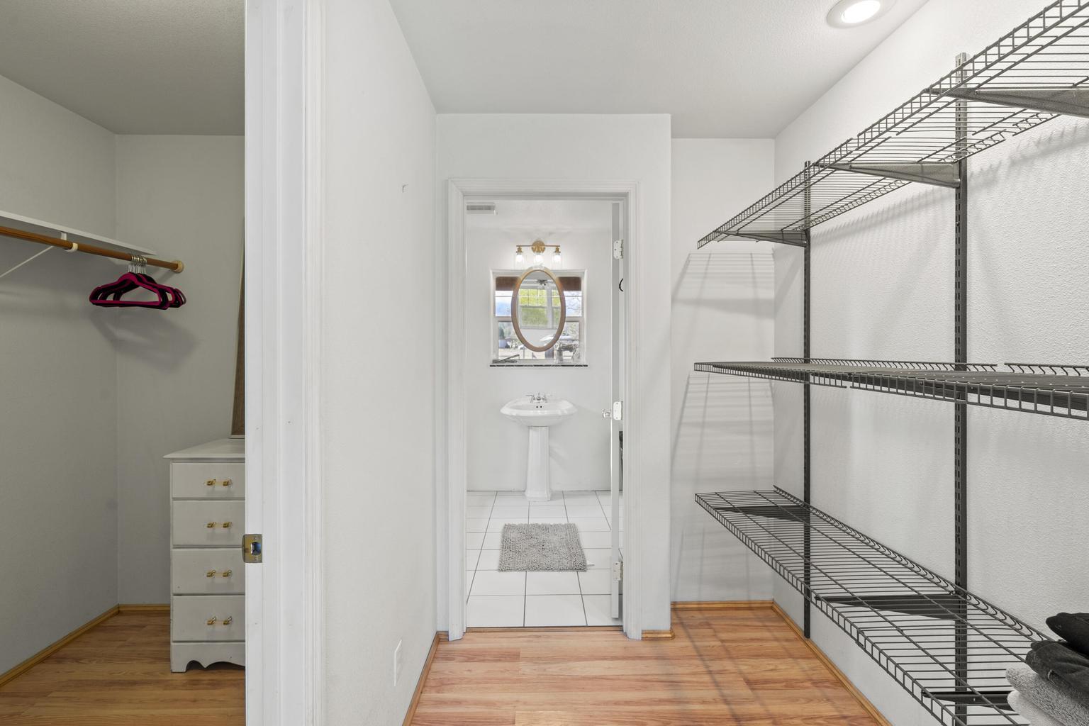 1190 Cedar Flat Road Williams, OR 97544 - Photo 16 of 45 a bedroom with a bed and glass door