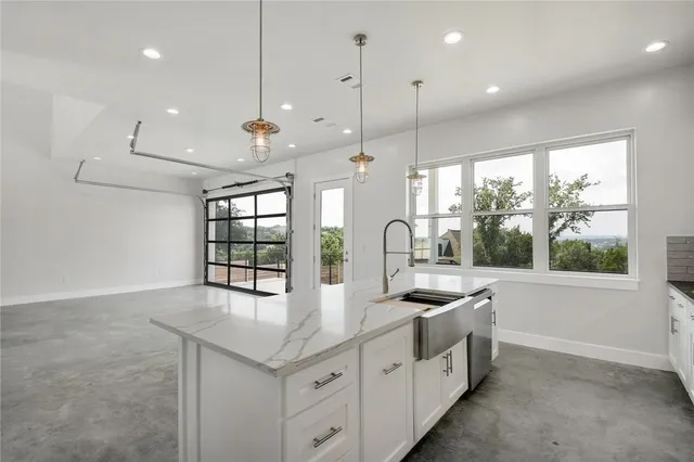 a kitchen with counter top space and a sink