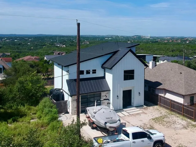 an aerial view of a house with a garden view