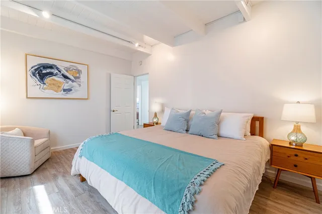 a bathroom with a sink a mirror and a vanity