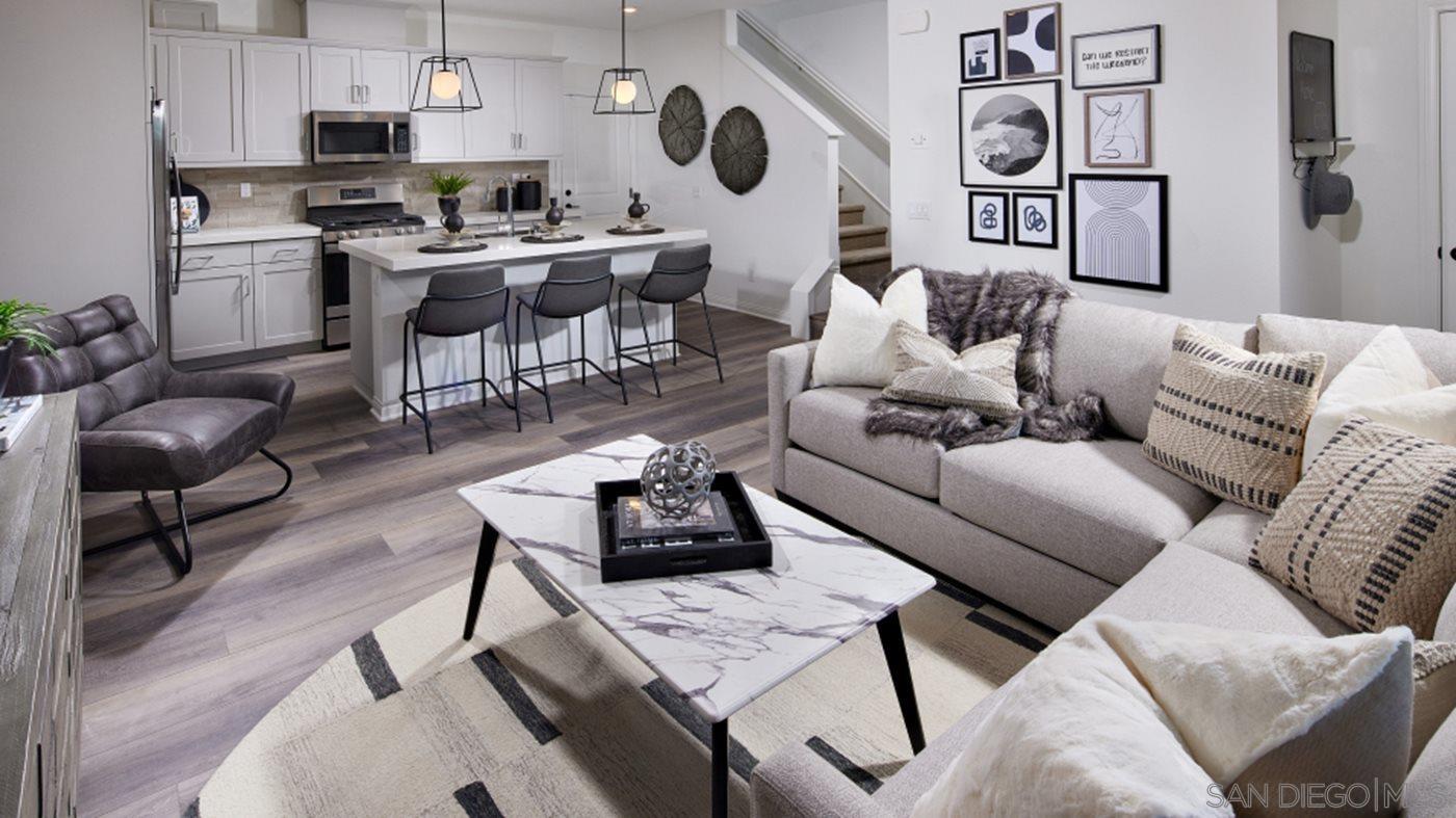 2021 Bluestone Circle, Unit HS71 PLAN Chula Vista, CA 91913 - Photo 6 of 12 a living room with furniture and a wooden floor