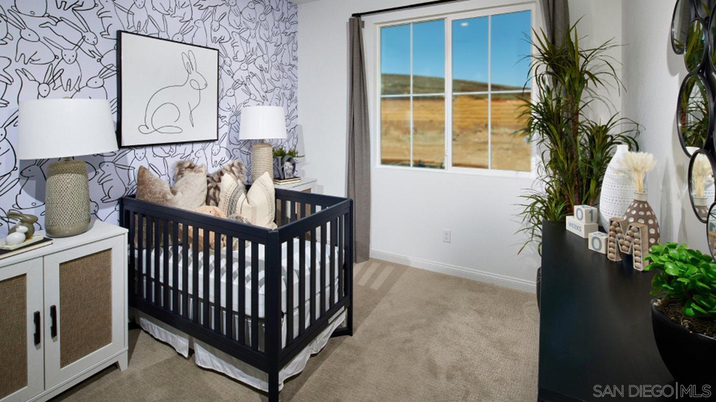 2021 Bluestone Circle, Unit HS71 PLAN Chula Vista, CA 91913 - Photo 10 of 12 a view of a porch with furniture