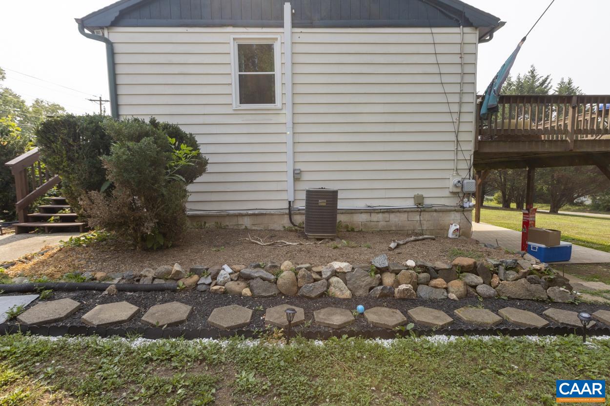 4764 Amicus Road Ruckersville, VA 22968 - Photo 12 of 33 a view of a backyard with plants and trees