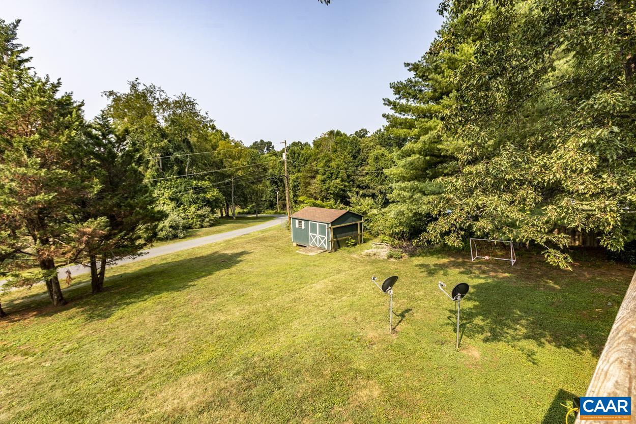 4764 Amicus Road Ruckersville, VA 22968 - Photo 33 of 33 a view of a yard with swimming pool