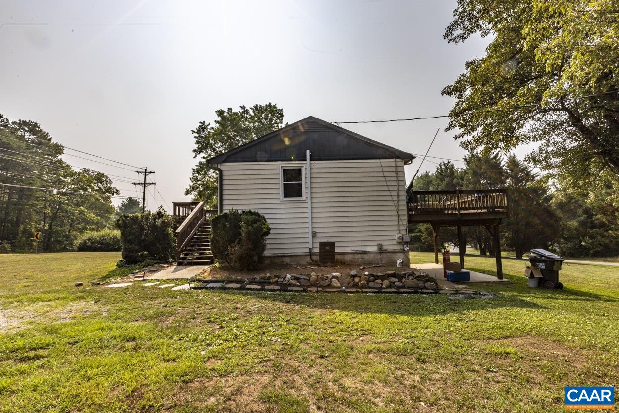 4764 Amicus Road Ruckersville, VA 22968 - Photo 6 of 33 a view of a house with backyard outdoor space and sitting area