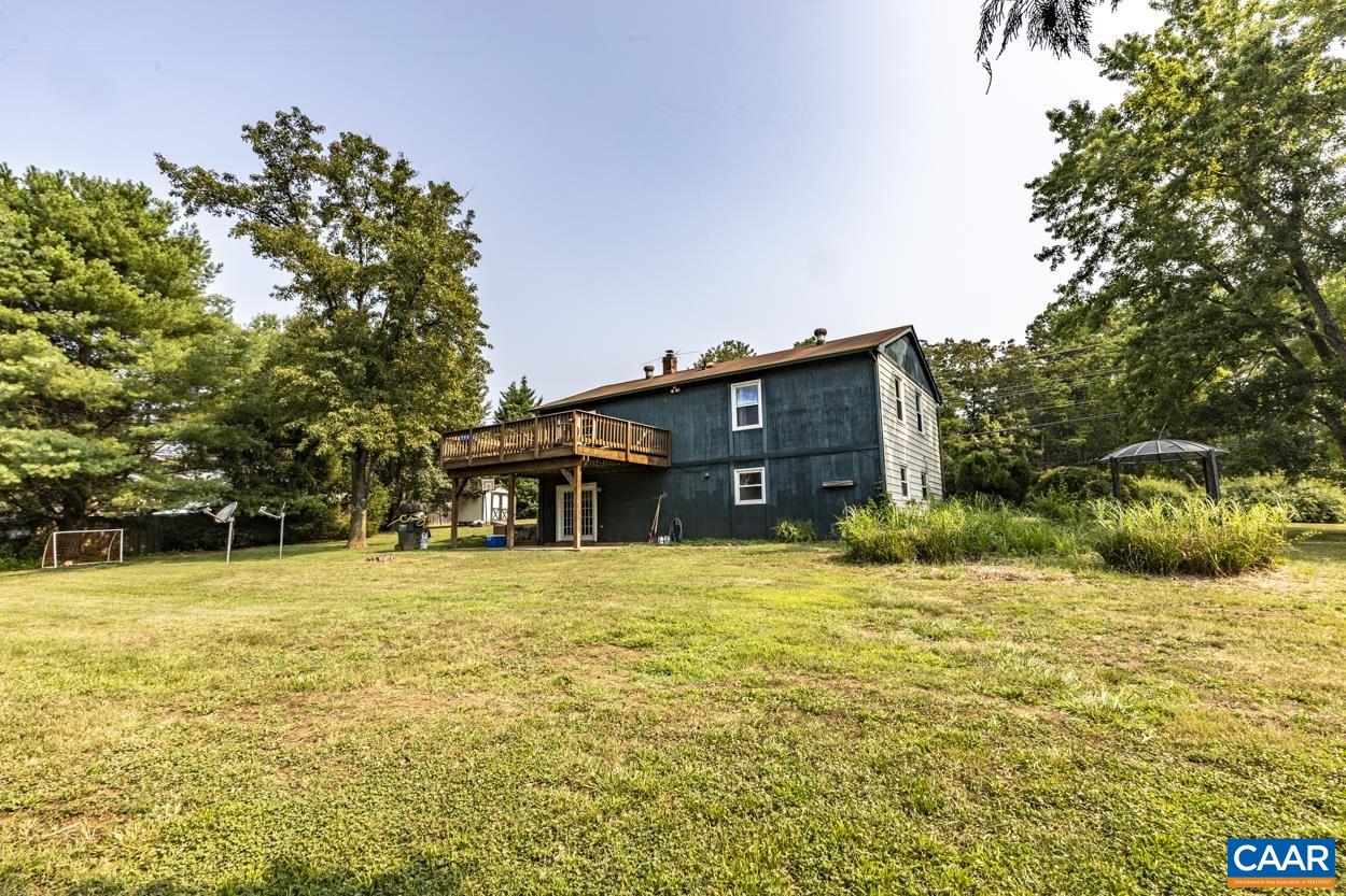 4764 Amicus Road Ruckersville, VA 22968 - Photo 8 of 33 a backyard of a house