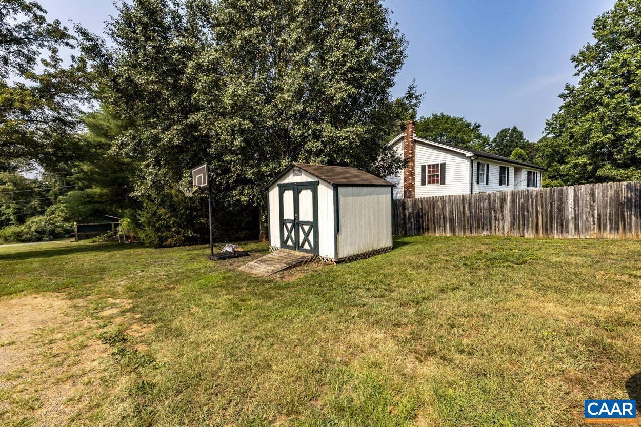 4764 Amicus Road Ruckersville, VA 22968 - Photo 10 of 33 a house with swimming pool in front of it