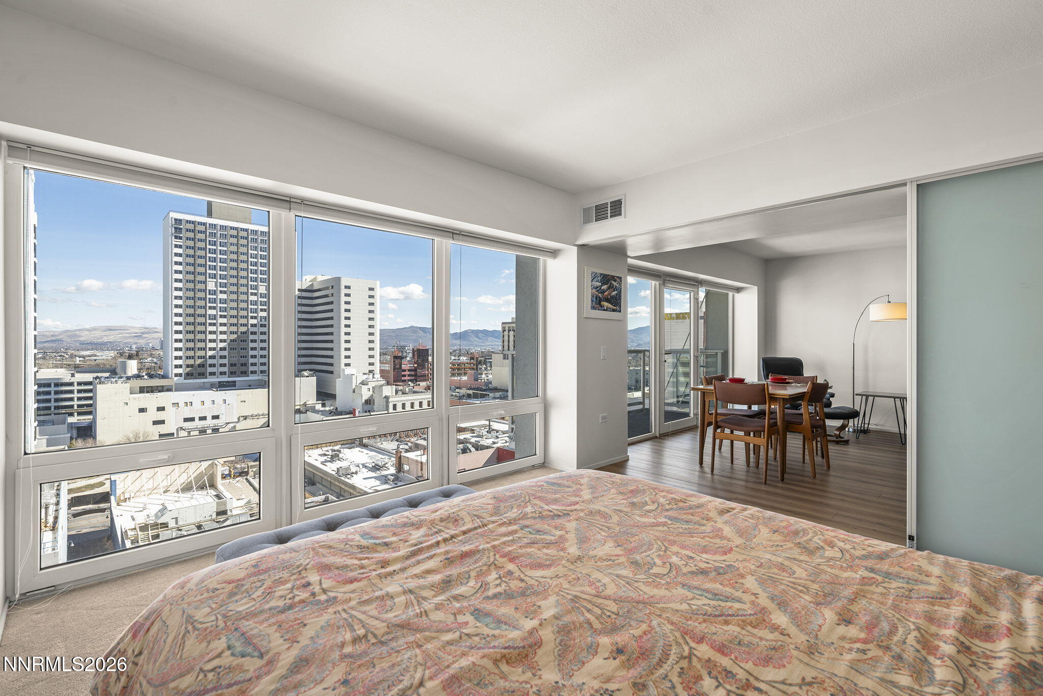 255 North Sierra Street, Unit 1408 Reno, NV 89501 - Photo 11 of 40 a bedroom with furniture and a large window