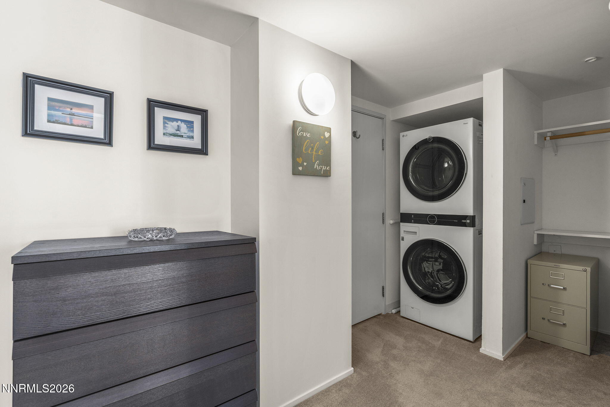 255 North Sierra Street, Unit 1408 Reno, NV 89501 - Photo 12 of 40 a view of a hallway with washer and dryer