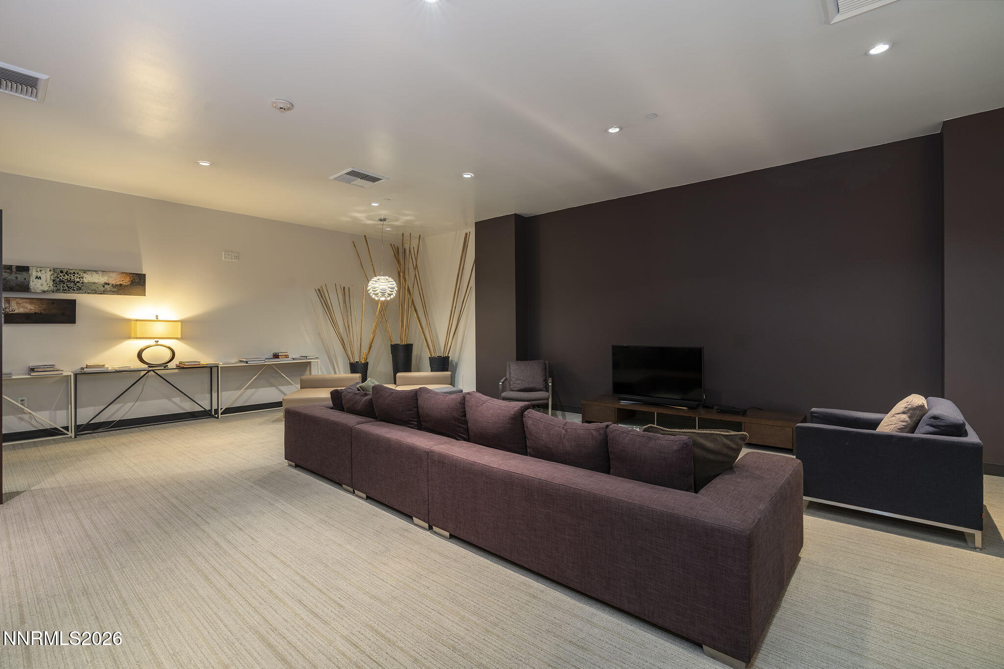 255 North Sierra Street, Unit 1408 Reno, NV 89501 - Photo 33 of 40 a living room with furniture and a flat screen tv