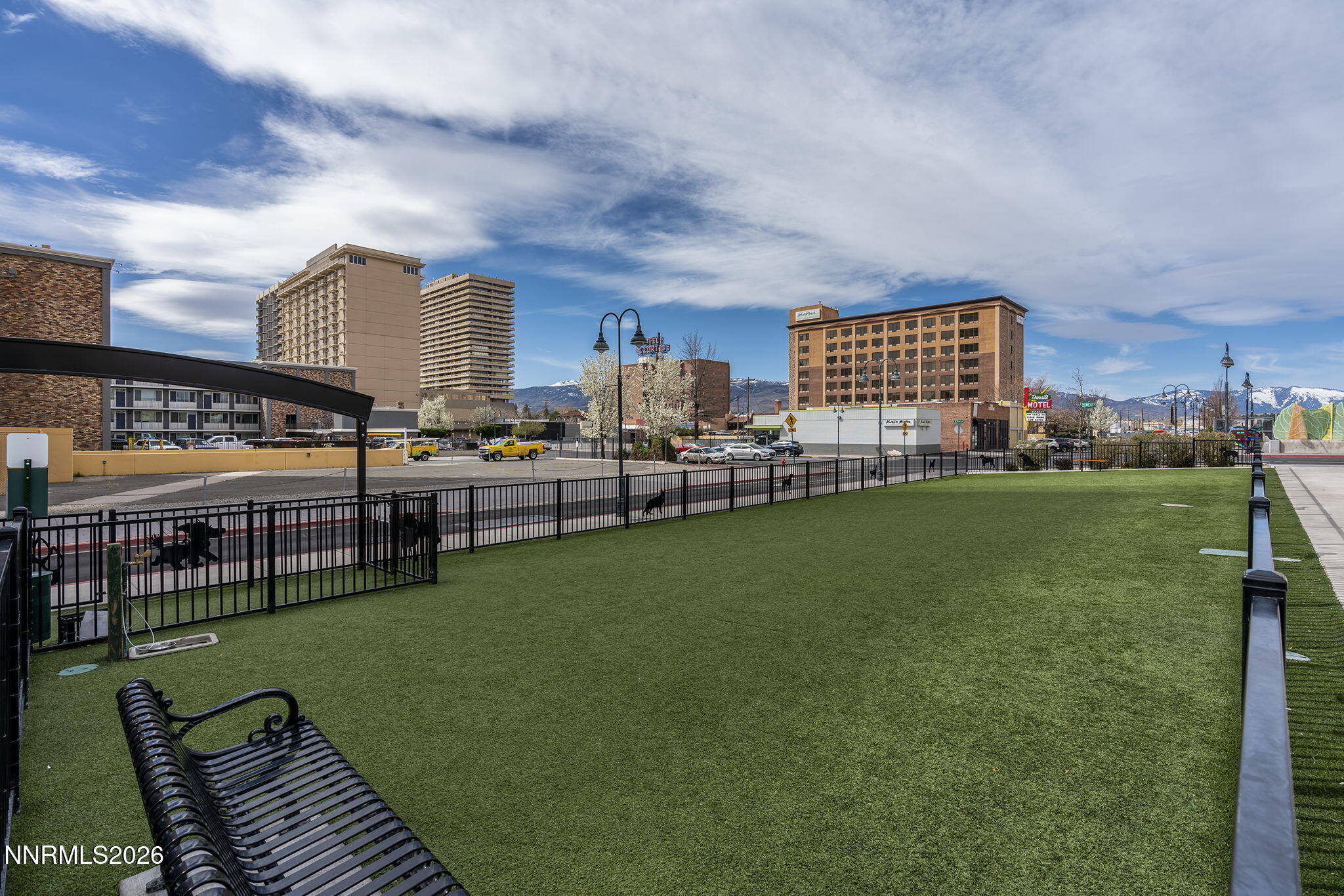 255 North Sierra Street, Unit 1408 Reno, NV 89501 - Photo 36 of 40 a city view with tall buildings and outdoor seating