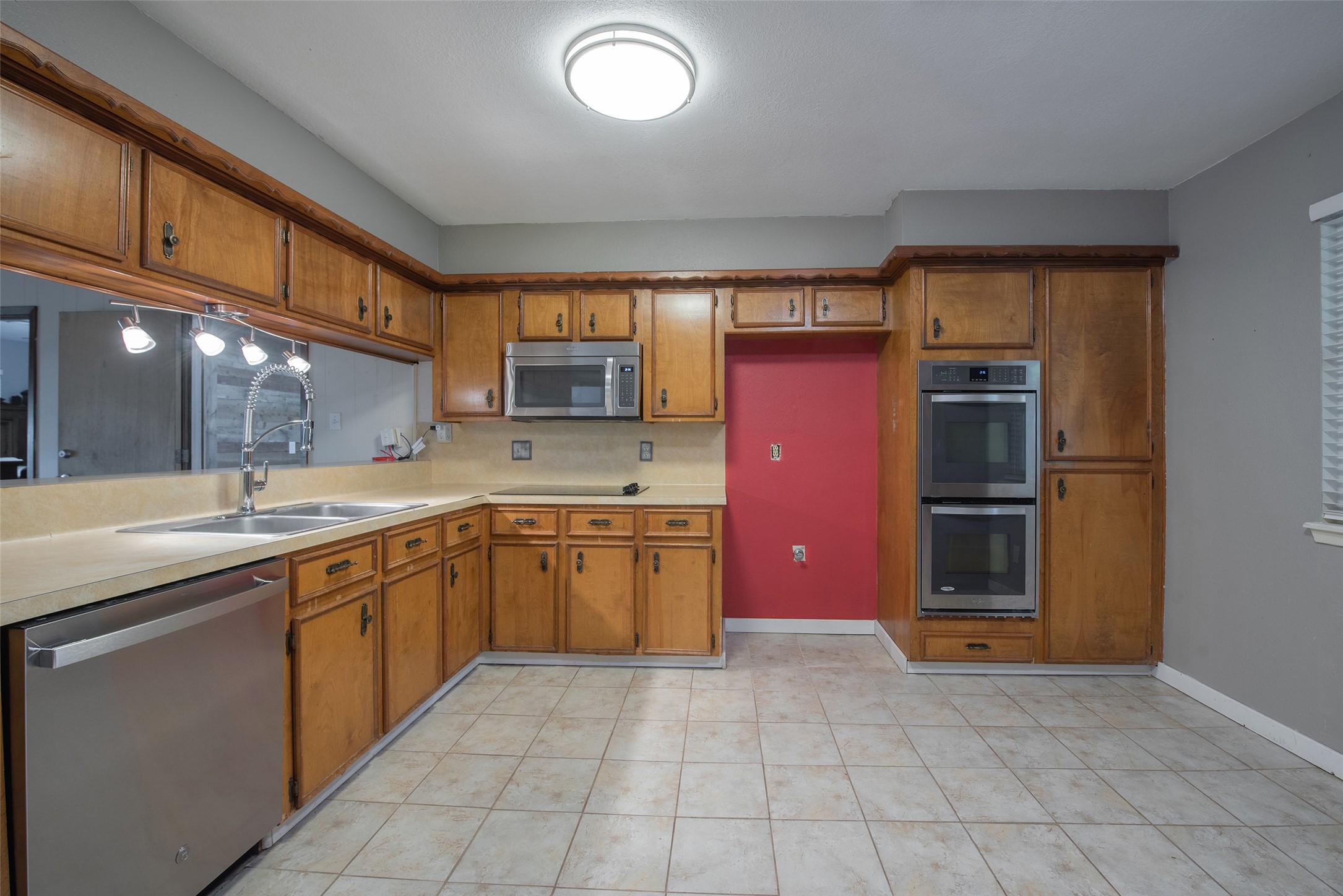 504 Walnut Street Waller, TX 77484 - Photo 10 of 35 Kitchen with Stainless Steel Appliances - Built In Microwave, Double Oven, and Dishwasher