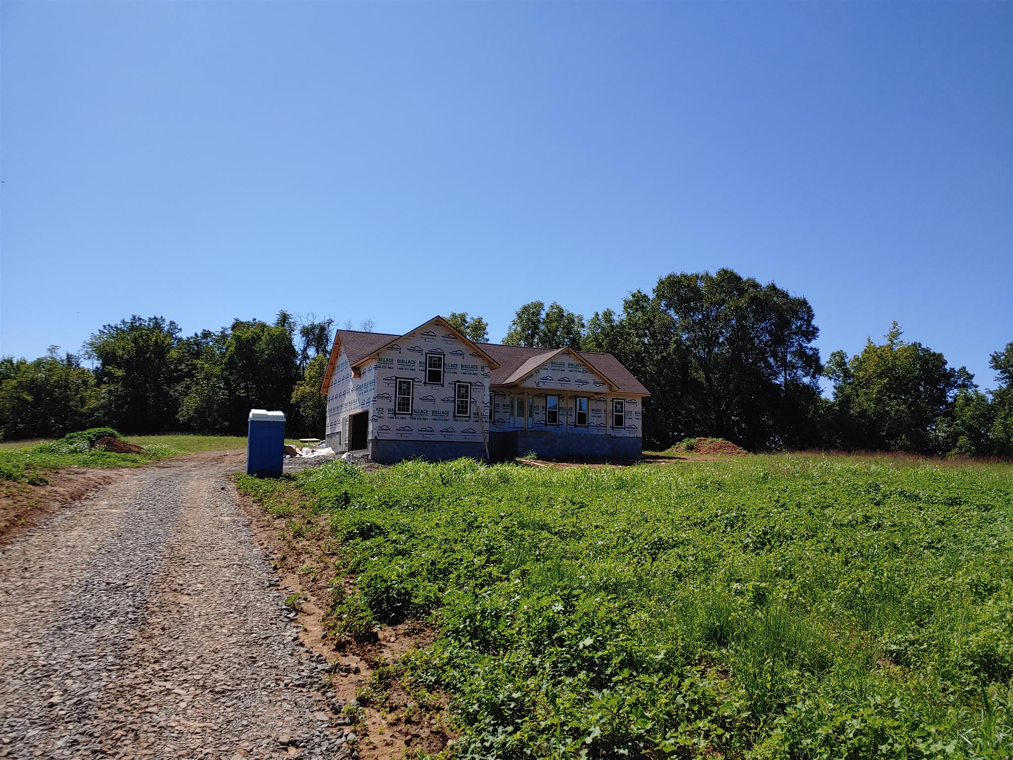 4083 Martins Chapel Road Springfield, TN 37172 - Photo 2 of 9 a view of a house with a big yard and large trees