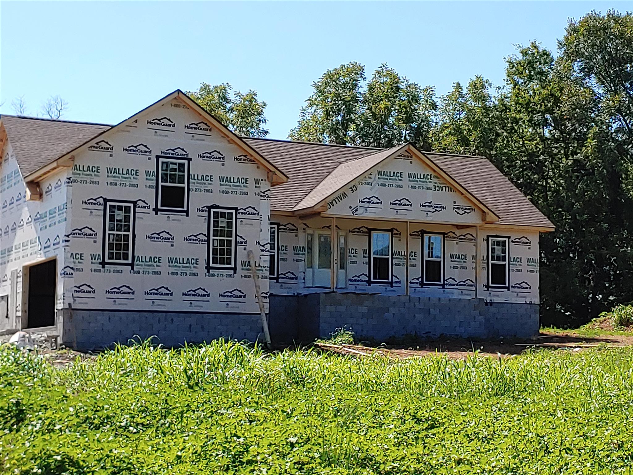 4083 Martins Chapel Road Springfield, TN 37172 - Photo 5 of 9 a front view of a house with a garden