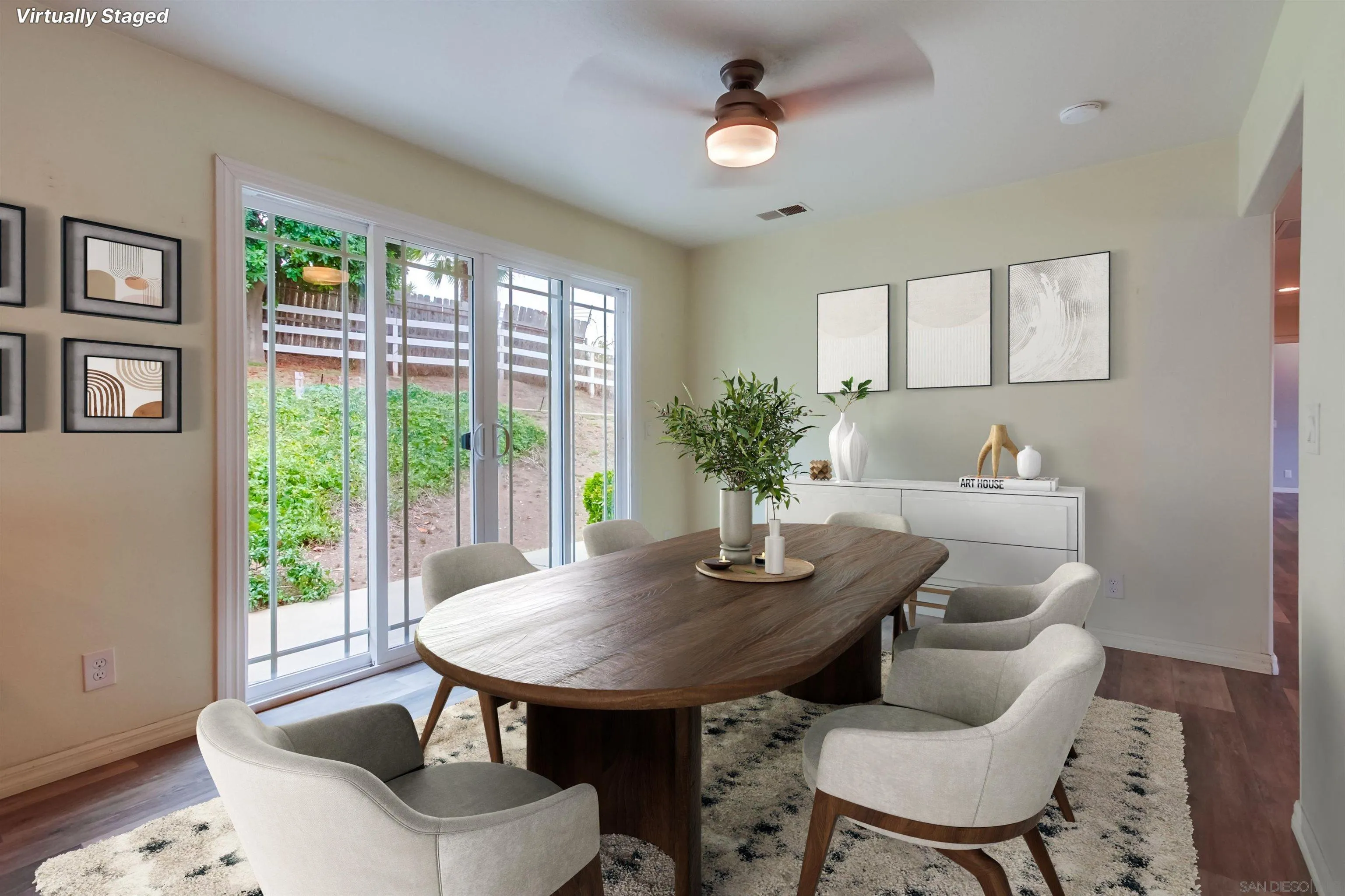 227 Hutchison Street Vista, CA 92084 - Photo 19 of 58 a view of a dining room with furniture window and outside view