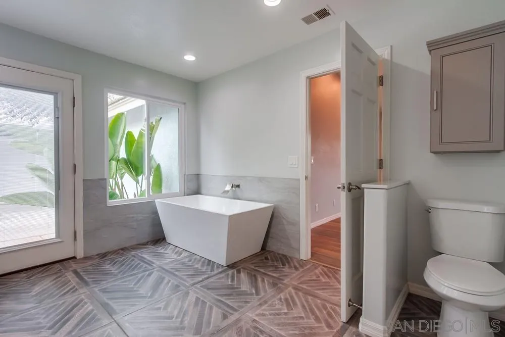 227 Hutchison Street Vista, CA 92084 - Photo 37 of 58 a bathroom with a sink toilet and shower