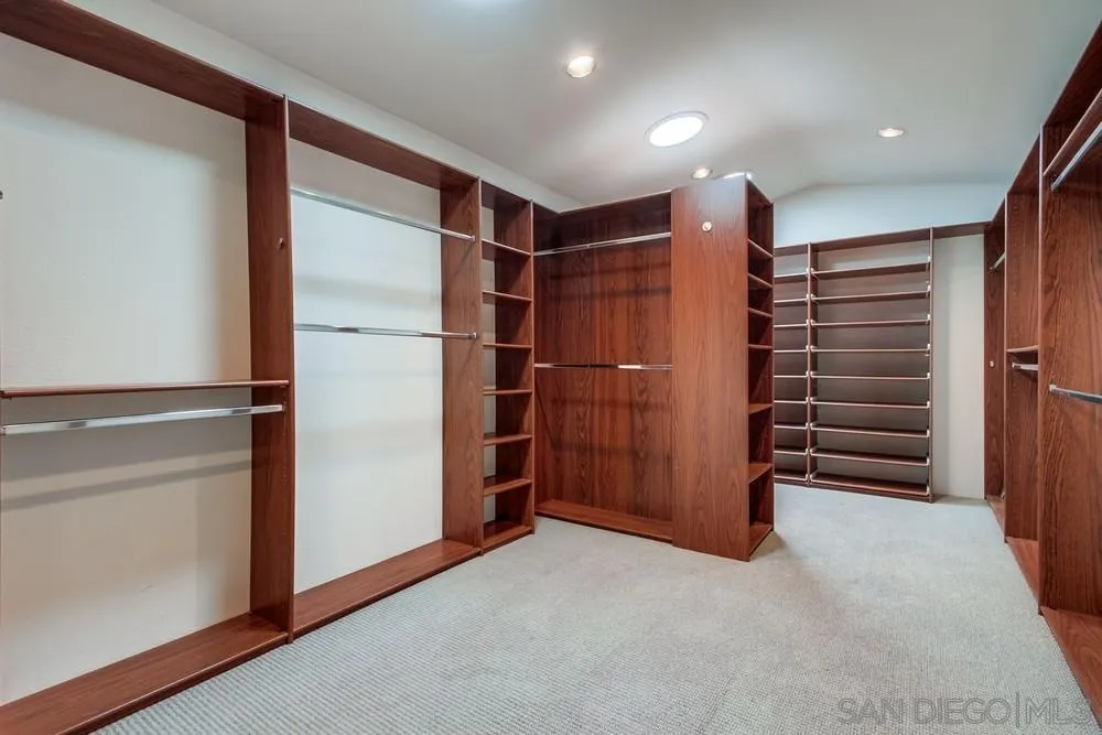 227 Hutchison Street Vista, CA 92084 - Photo 39 of 58 a view of an empty room with a staircase