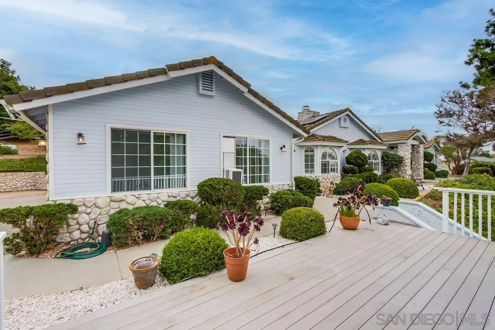 227 Hutchison Street Vista, CA 92084 - Photo 4 of 58 a front view of a house with porch