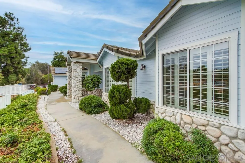 227 Hutchison Street Vista, CA 92084 - Photo 5 of 58 a house with a garden view
