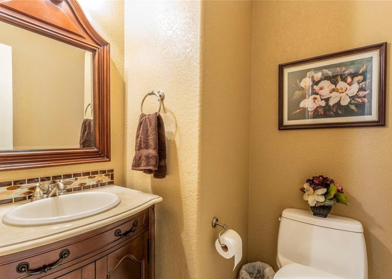 1100 Antelope Ridge Cedar Park, TX 78613 - Photo 20 of 24 a bathroom with a sink mirror and toilet