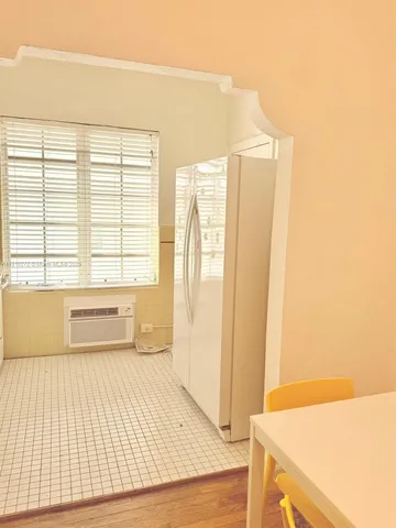 a bathroom with a bathtub and a sink