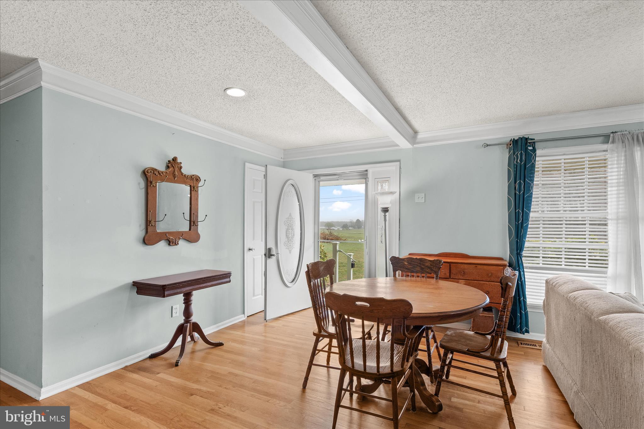 12647 Old Stage Road Bishopville, MD 21813 - Photo 60 of 84 a view of a dining room with furniture and a window
