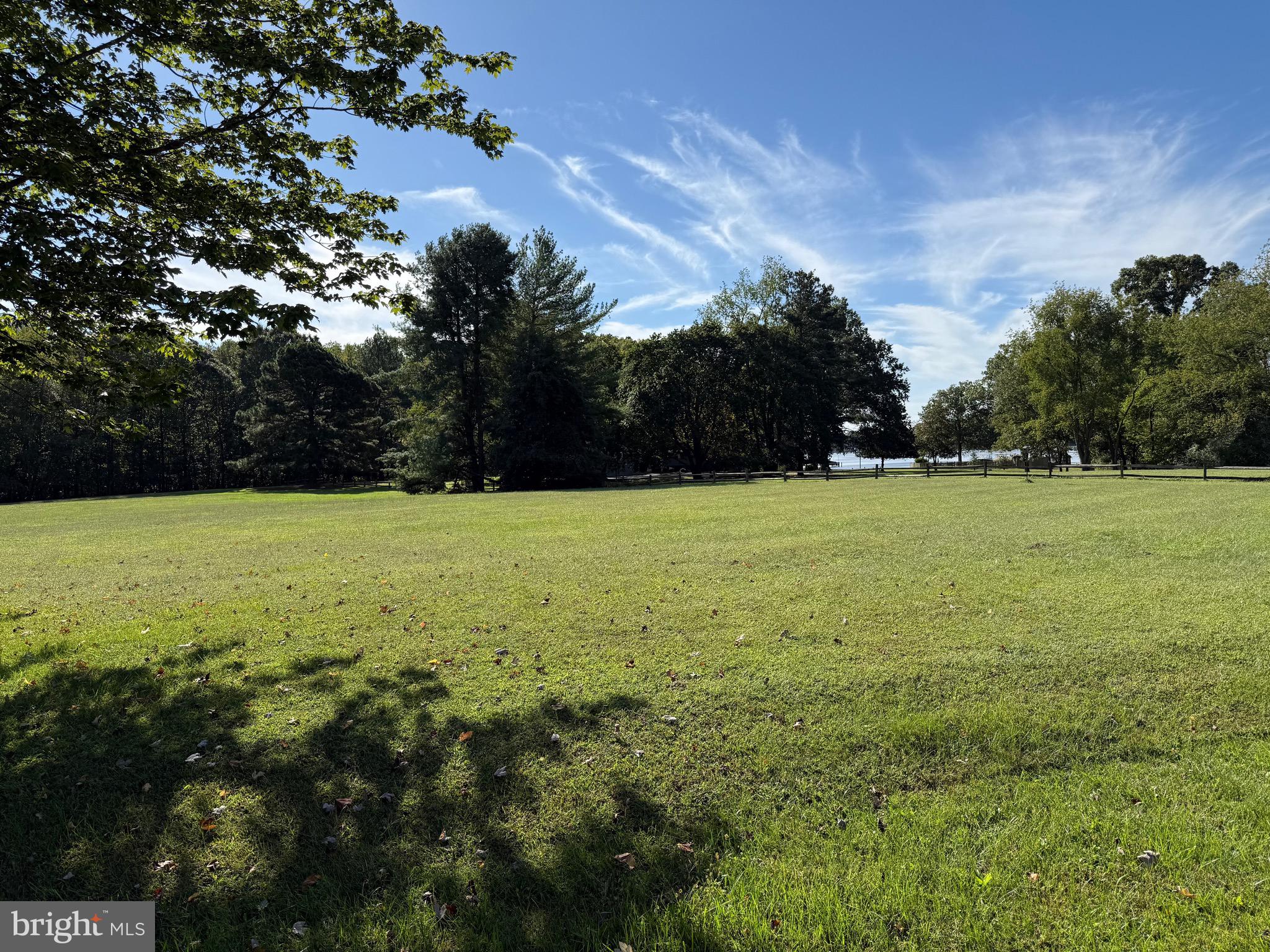 915 Sportsman Neck Road Queenstown, MD 21658 - Photo 14 of 33 a view of a green field with clear sky