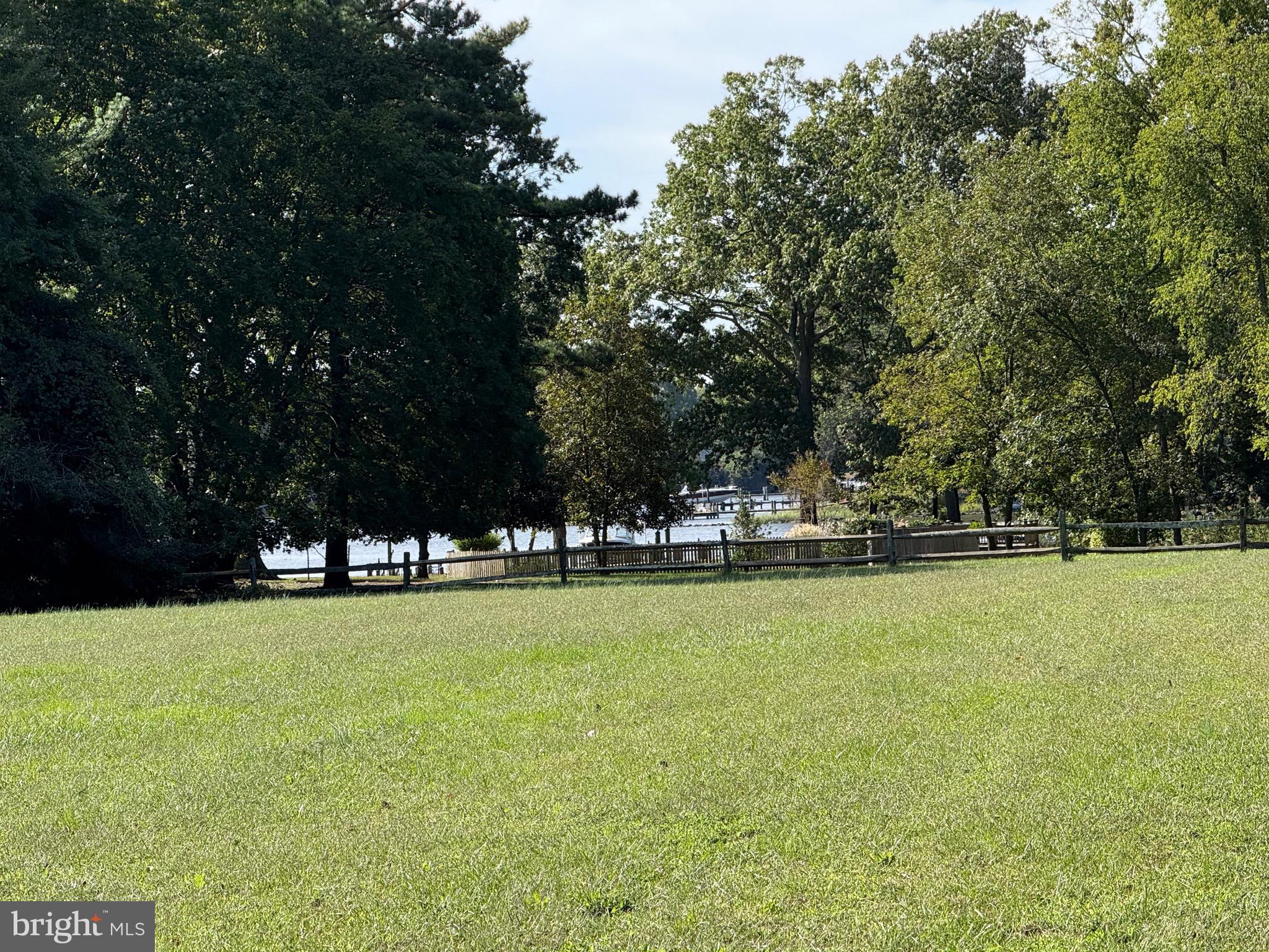 915 Sportsman Neck Road Queenstown, MD 21658 - Photo 5 of 33 a view of a swimming pool with trees