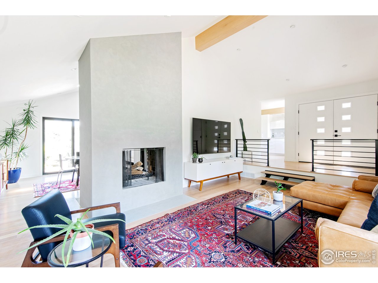 8835 Pine Cone Lane Niwot, CO 80503 - Photo 10 of 32 pass through wood burning fireplace