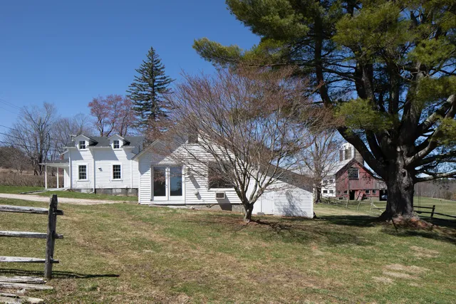 a view of a town with large trees