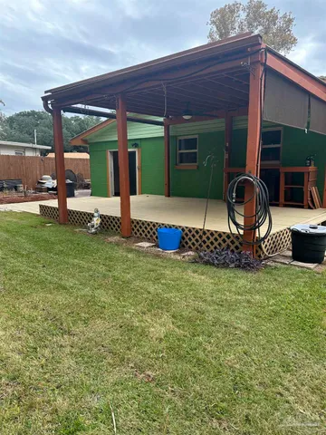 a house view with a garden space