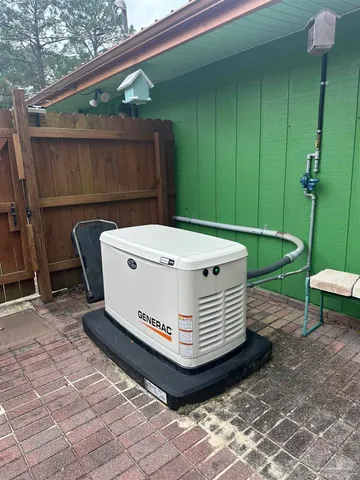 a view of a backyard with chairs and table