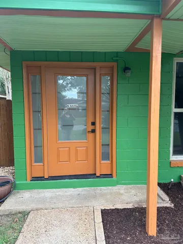 a small garden in the corners of a house