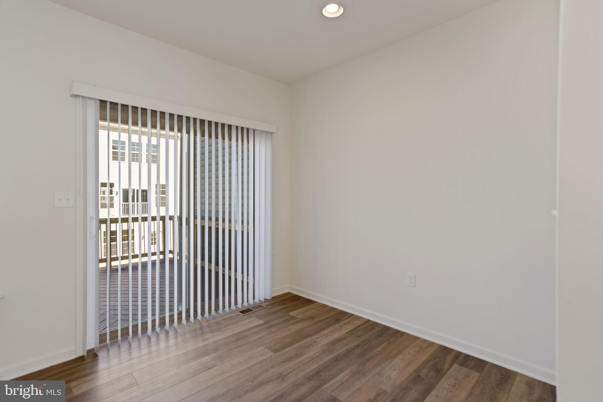 102 Alderman Way Winchester, VA 22602 - Photo 4 of 13 Sliders to deck from eating area