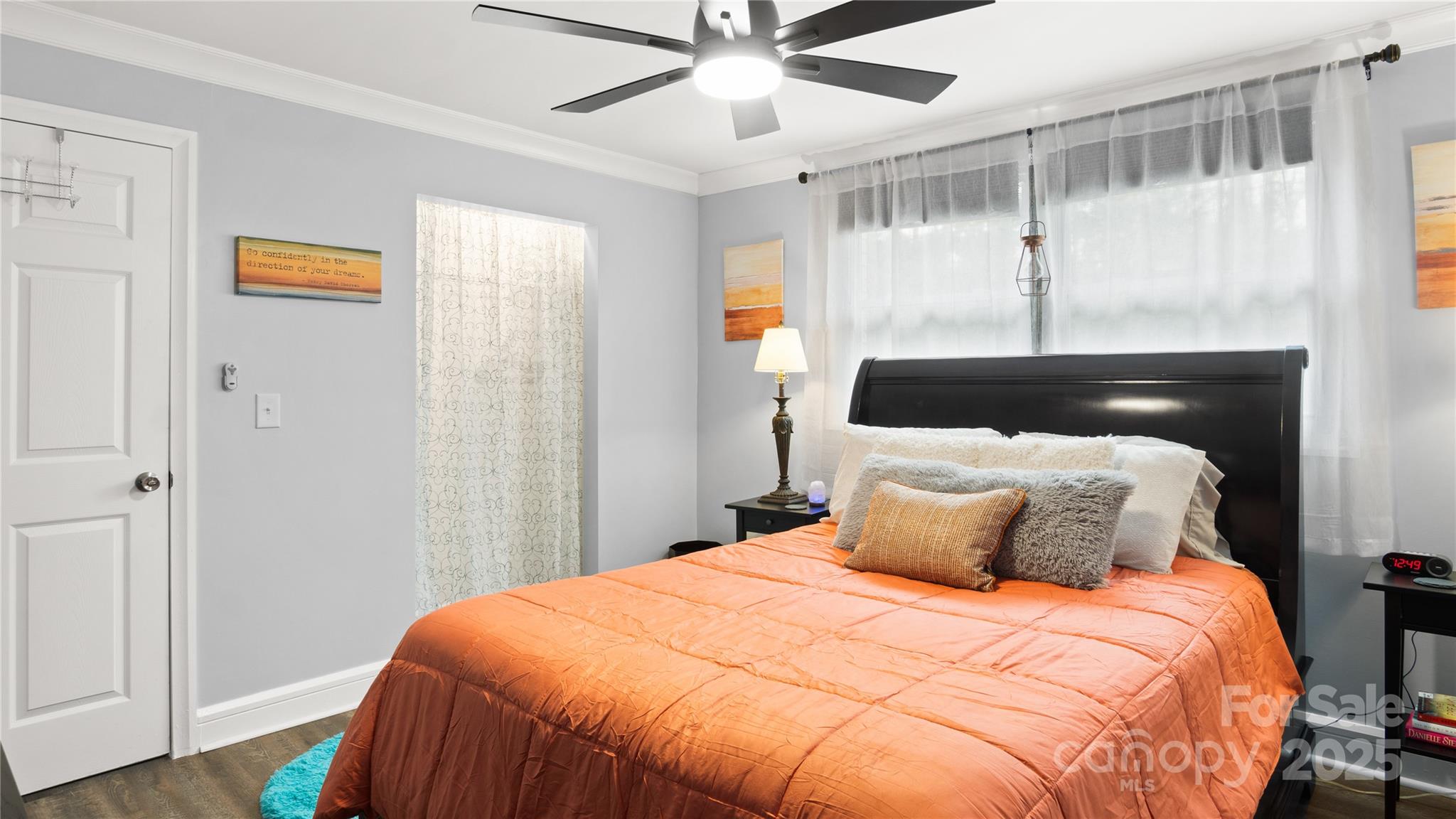 318 Lake Montonia Road Kings Mountain, NC 28086 - Photo 11 of 23 a bedroom with a bed and wooden floor