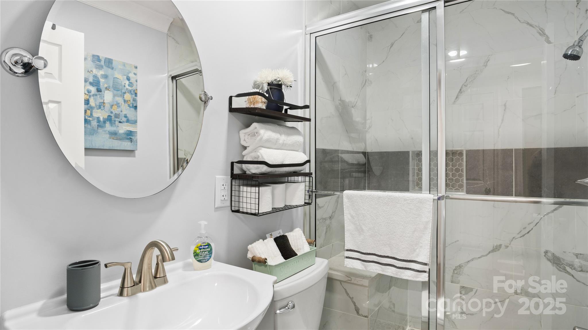 318 Lake Montonia Road Kings Mountain, NC 28086 - Photo 13 of 23 a bathroom with a sink and a mirror