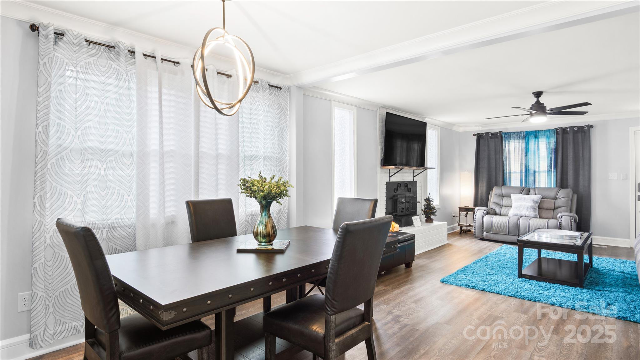 318 Lake Montonia Road Kings Mountain, NC 28086 - Photo 5 of 23 a view of a dining room with furniture window and wooden floor