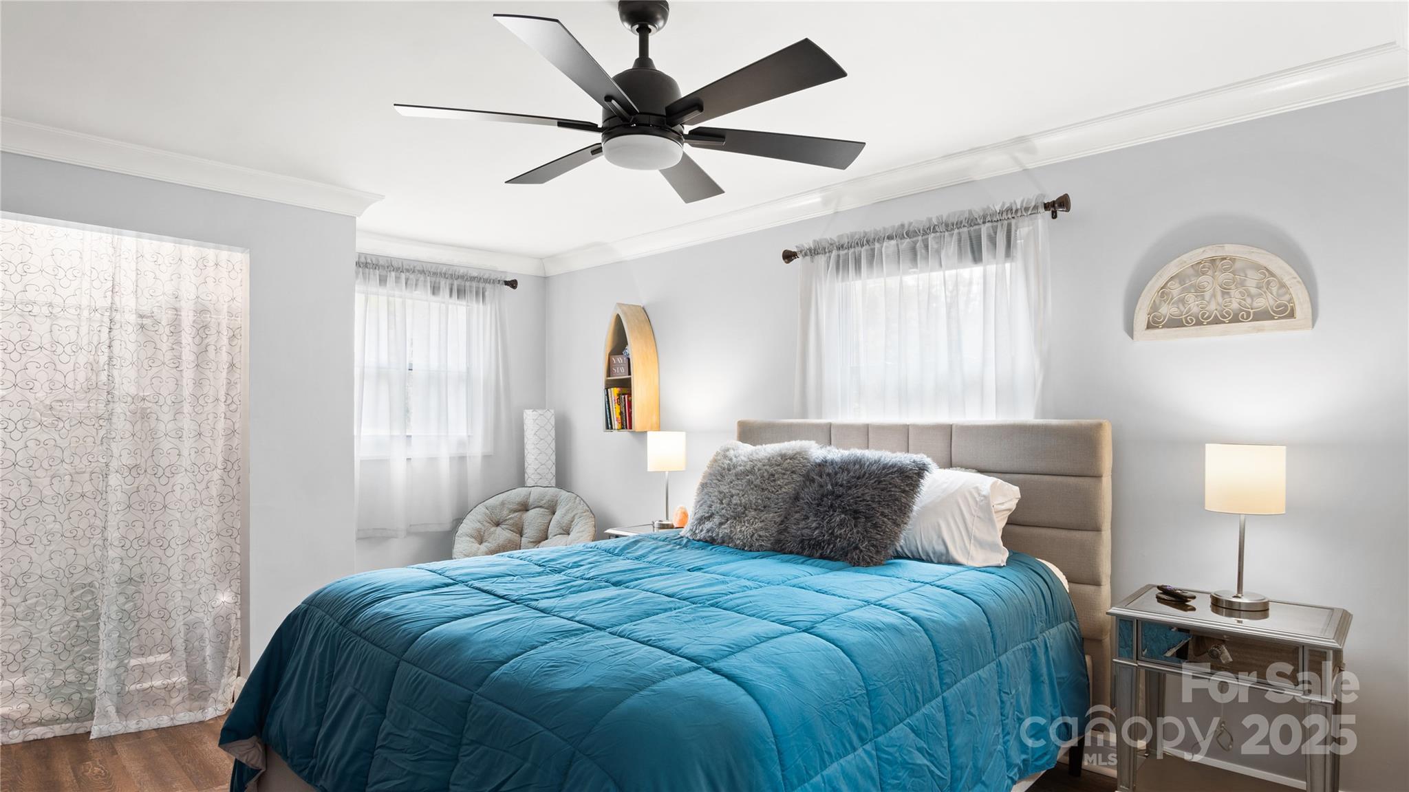 318 Lake Montonia Road Kings Mountain, NC 28086 - Photo 6 of 23 a bedroom with a bed and a lamp on a dresser