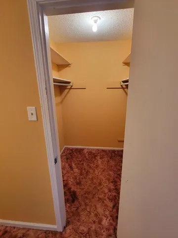 a view of hallway with stairs