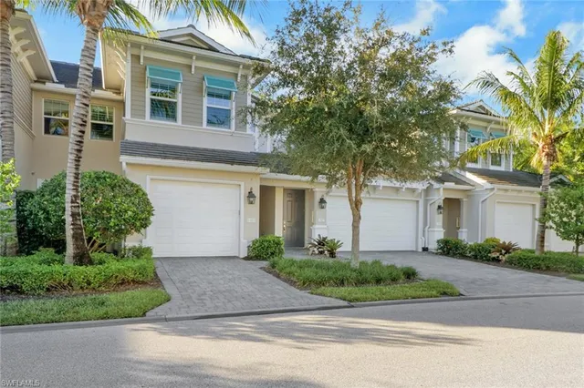 front view of a house and a yard