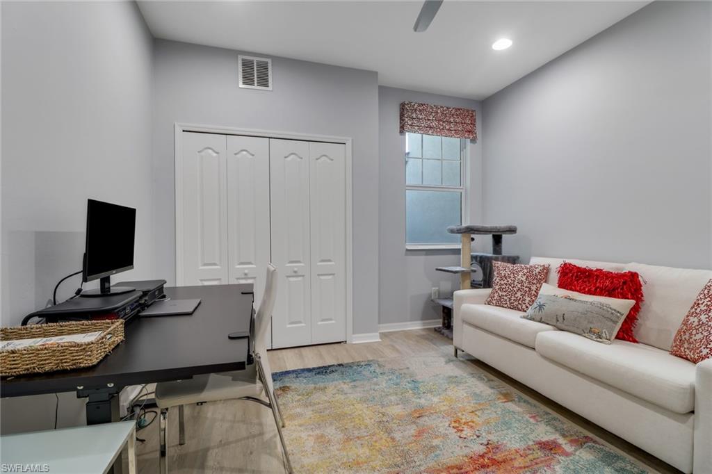 6973 Avalon Circle, Unit 1403 Naples, FL 34112 - Photo 13 of 37 Office area featuring light wood-style flooring, recessed lighting, and ceiling fan