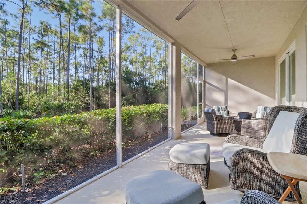 6973 Avalon Circle, Unit 1403 Naples, FL 34112 - Photo 24 of 37 Sunroom featuring ceiling fan and outdoor lounge area