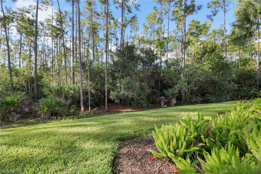 6973 Avalon Circle, Unit 1403 Naples, FL 34112 - Photo 25 of 37 View of grassy yard