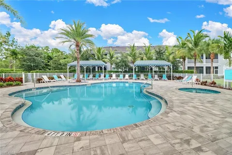 a view of a swimming pool with a patio